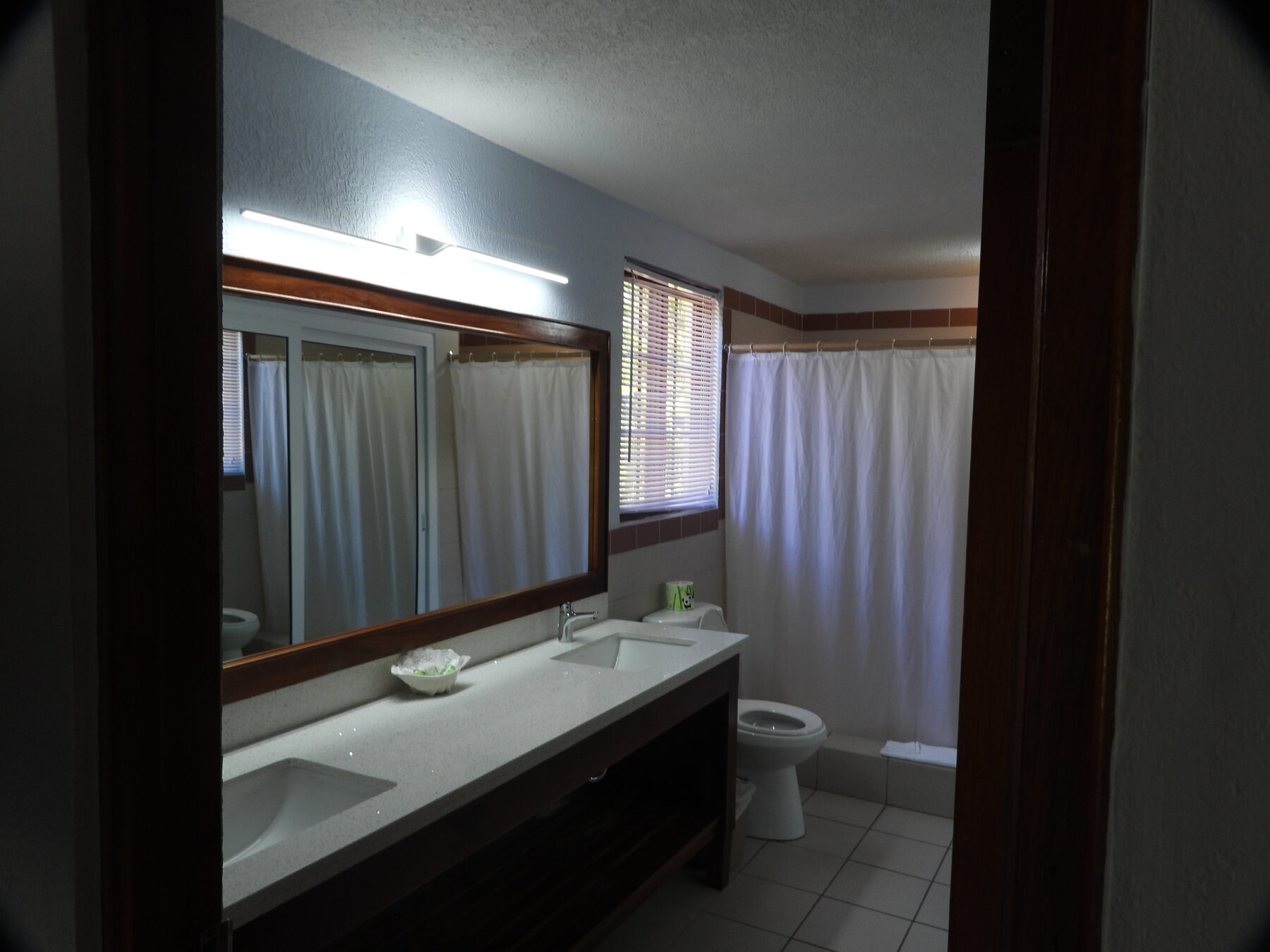 Existing hotel vanity before renovation