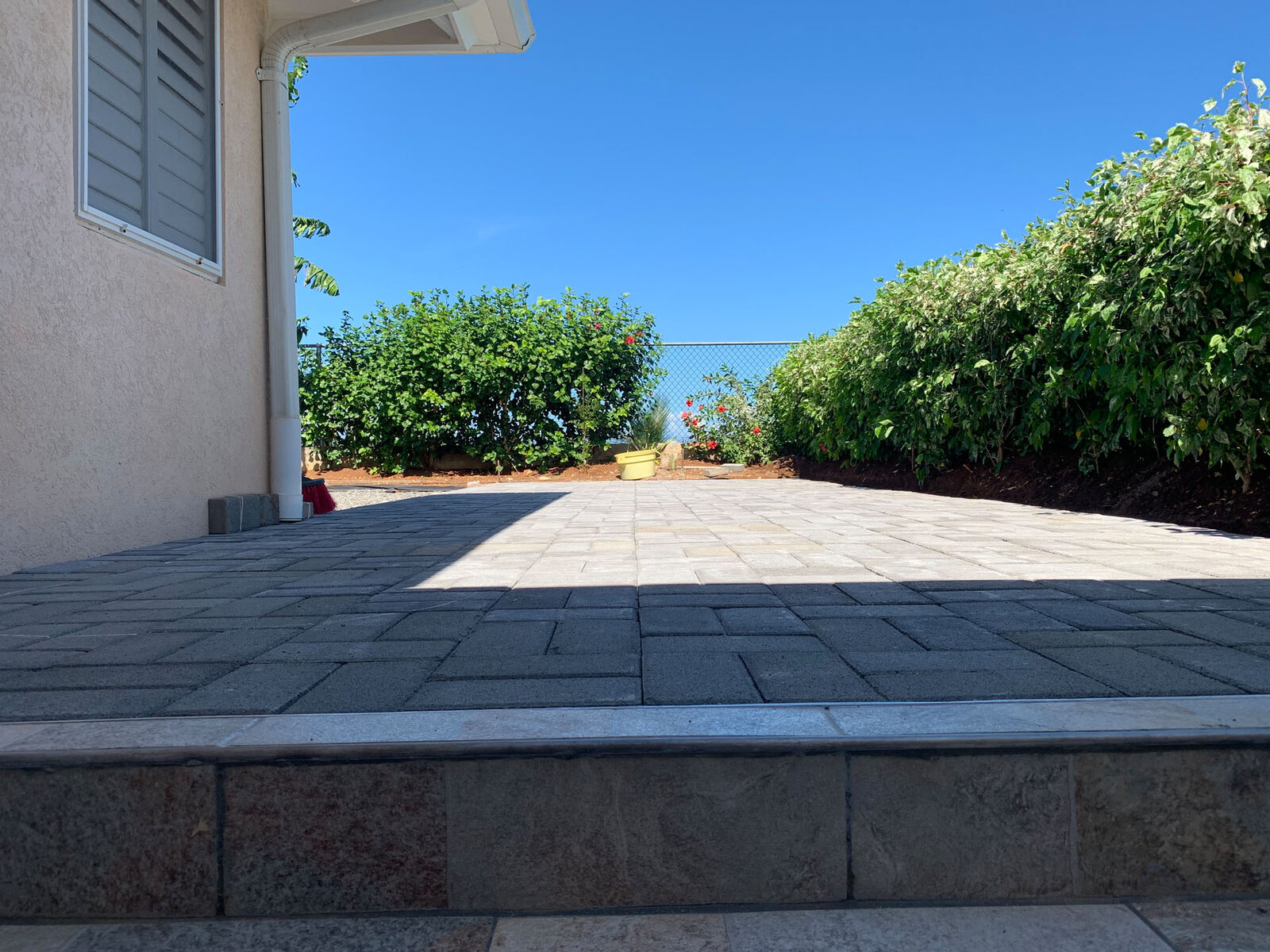 New paved terrace and garden view
